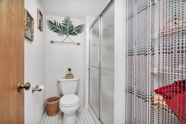 10528 Ridge Cove Dr Unit 11A, Chicago Ridge, IL 60415 - full bathroom with a stall shower, toilet, and tile patterned flooring