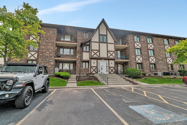 10528 Ridge Cove Dr Unit 11A, Chicago Ridge, IL 60415 - view of property with uncovered parking