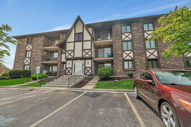 10528 Ridge Cove Dr Unit 11A, Chicago Ridge, IL 60415 - view of building exterior with uncovered parking