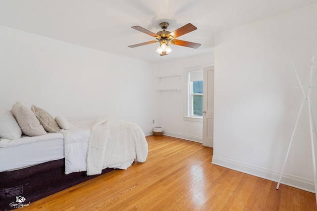915 E Duane Blvd, Kankakee, IL 60901 - bedroom with light wood-type flooring, baseboards, and ceiling fan