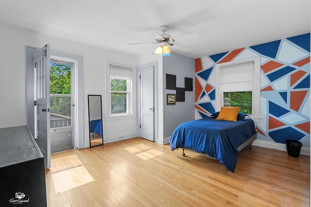 915 E Duane Blvd, Kankakee, IL 60901 - bedroom featuring wood finished floors, baseboards, and a ceiling fan