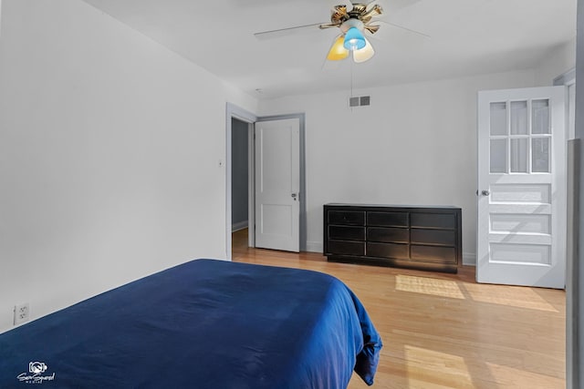 915 E Duane Blvd, Kankakee, IL 60901 - bedroom with wood finished floors, ceiling fan, and baseboards