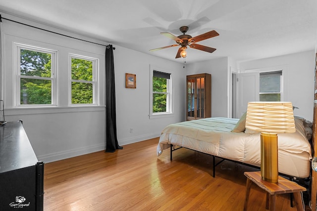 915 E Duane Blvd, Kankakee, IL 60901 - bedroom featuring light wood finished floors, baseboards, and ceiling fan