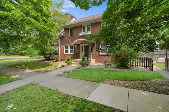 915 E Duane Blvd, Kankakee, IL 60901 - view of front facade featuring brick siding and a chimney