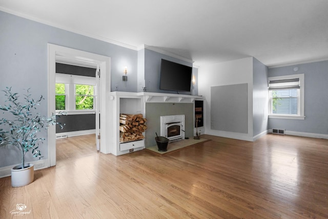 915 E Duane Blvd, Kankakee, IL 60901 - living area with wood finished floors, baseboards, and ornamental molding