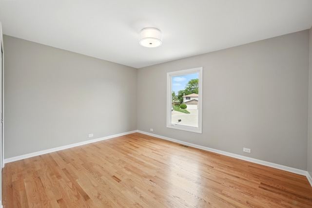 8306 Regency Ct, Willow Springs, IL 60480 - unfurnished room with baseboards and light wood-type flooring
