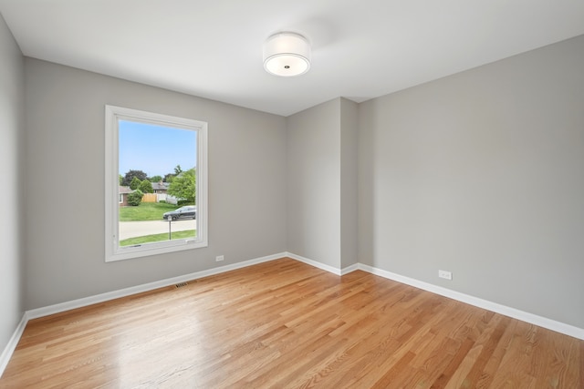 8306 Regency Ct, Willow Springs, IL 60480 - empty room with light wood finished floors and baseboards