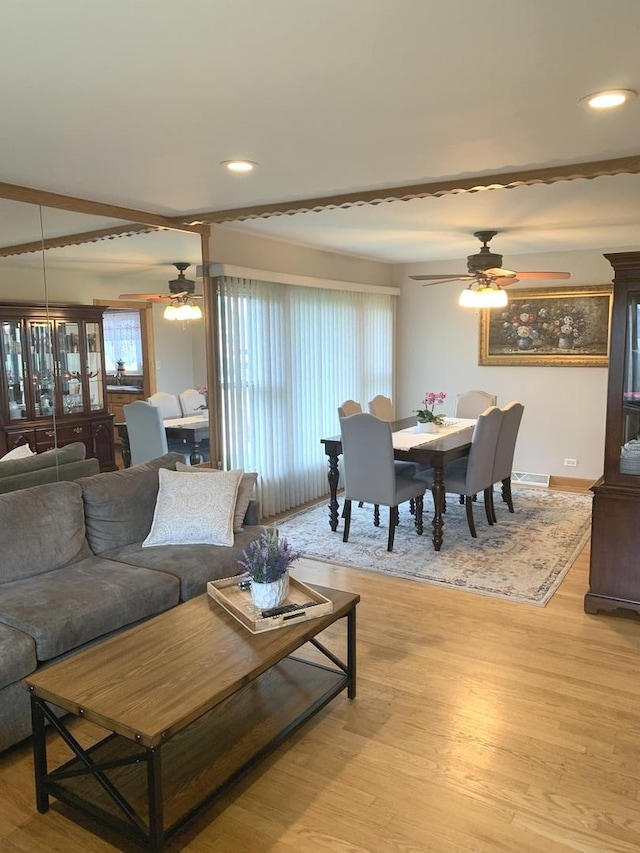 8500 W Winona St, Chicago, IL 60656 - living room featuring a ceiling fan, light wood-style flooring, recessed lighting, and baseboards