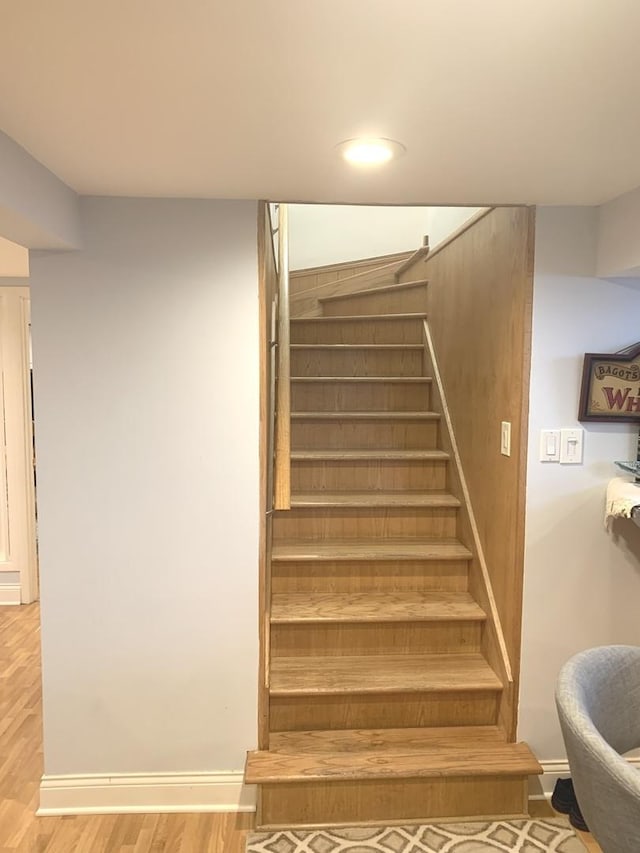 8500 W Winona St, Chicago, IL 60656 - staircase featuring wood finished floors, baseboards, and recessed lighting
