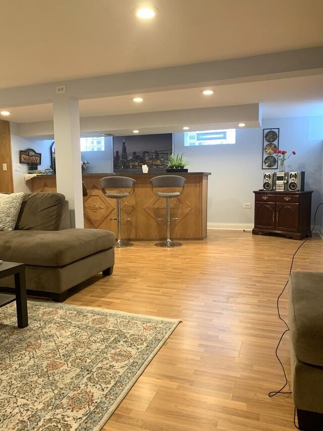 8500 W Winona St, Chicago, IL 60656 - living room with bar, healthy amount of natural light, light wood finished floors, recessed lighting, and baseboards