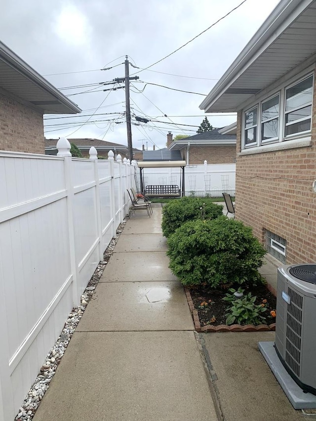8500 W Winona St, Chicago, IL 60656 - view of yard featuring central AC
