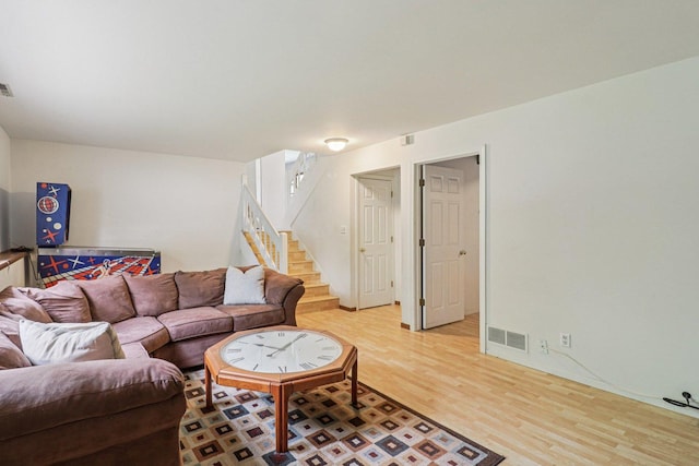 1705 N Donovan St, Mchenry, IL 60050 - living room with light wood-type flooring and stairway