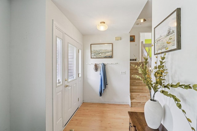 1705 N Donovan St, Mchenry, IL 60050 - foyer entrance with light wood-style floors and baseboards