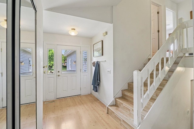 1705 N Donovan St, Mchenry, IL 60050 - foyer featuring light wood finished floors and stairs