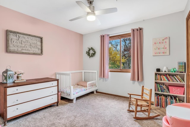 25911 W Highpoint Rd, Ingleside, IL 60041 - carpeted bedroom featuring a crib, baseboards, and ceiling fan