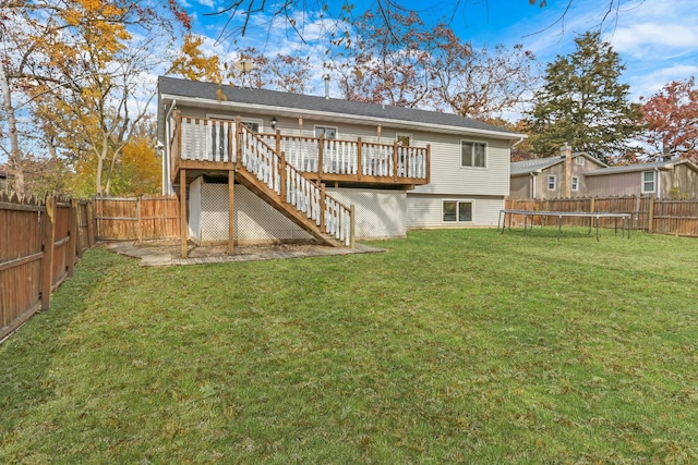25911 W Highpoint Rd, Ingleside, IL 60041 - rear view of house featuring a trampoline, a deck, and stairway
