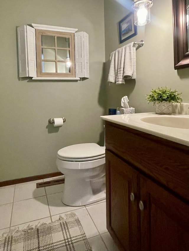 17581 W Summit Dr, Grayslake, IL 60030 - half bathroom with vanity and tile patterned floors