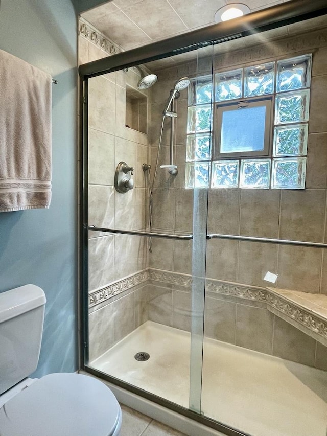 17581 W Summit Dr, Grayslake, IL 60030 - bathroom with a shower stall, healthy amount of natural light, and tile patterned floors