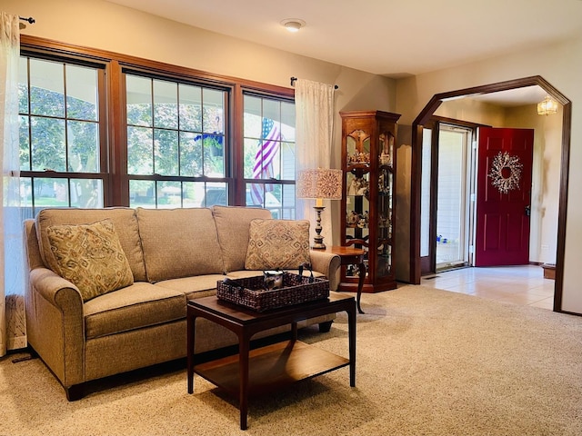 17581 W Summit Dr, Grayslake, IL 60030 - living room with light carpet, arched walkways, and light tile patterned floors