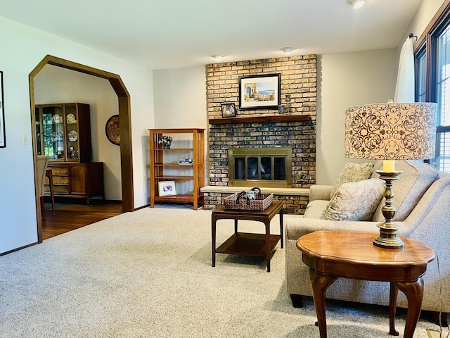 17581 W Summit Dr, Grayslake, IL 60030 - living area with carpet floors, a fireplace, and arched walkways