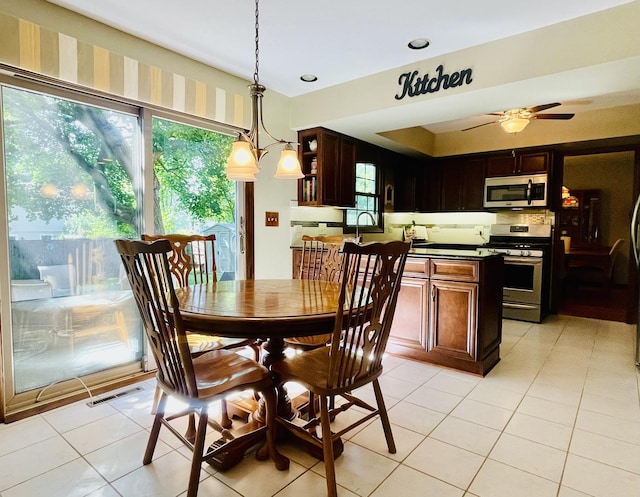 17581 W Summit Dr, Grayslake, IL 60030 - dining area featuring light tile patterned floors, a ceiling fan, and recessed lighting