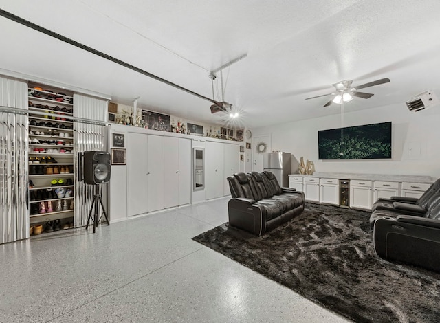 28 Old Farm S Ct, Bradley, IL 60915 - living room with speckle patterned floor and ceiling fan