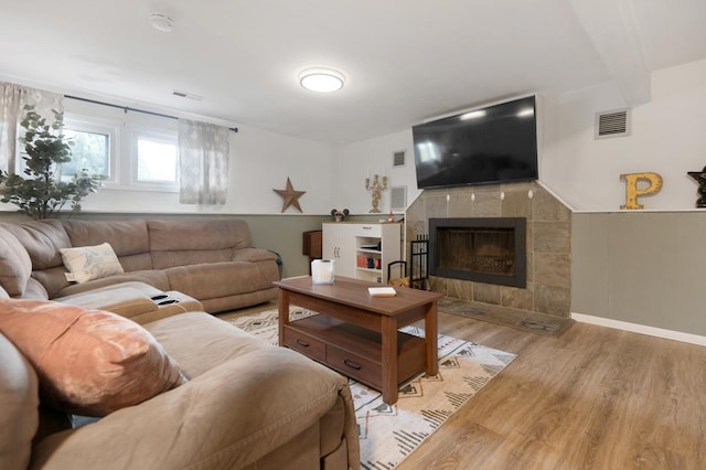 6130 Belmont Rd, Downers Grove, IL 60516 - living room featuring wood finished floors and a fireplace