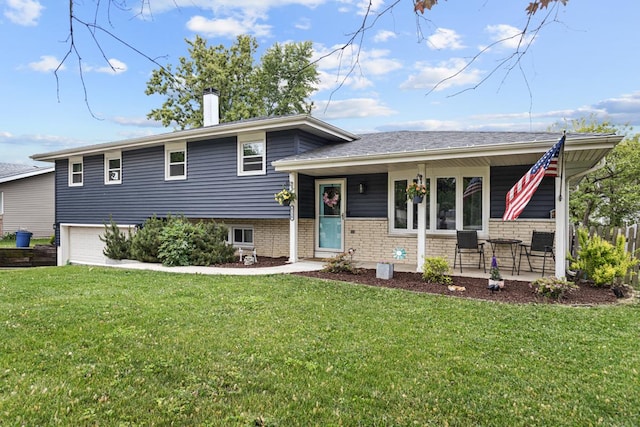 6130 Belmont Rd, Downers Grove, IL 60516 - split level home featuring a porch, an attached garage, a front lawn, a chimney, and brick siding