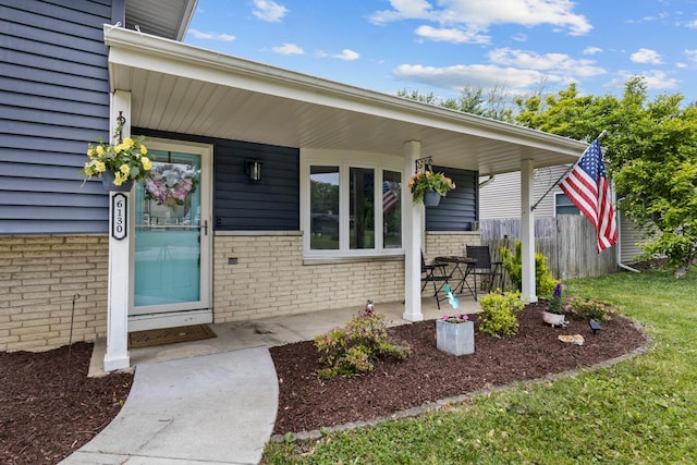 6130 Belmont Rd, Downers Grove, IL 60516 - view of exterior entry with brick siding and covered porch