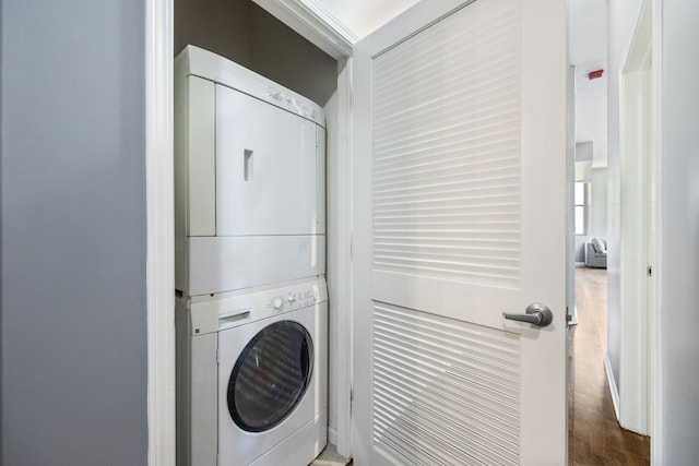 1464 S Michigan Ave Unit 2203, Chicago, IL 60605 - laundry area featuring stacked washer / dryer and wood finished floors