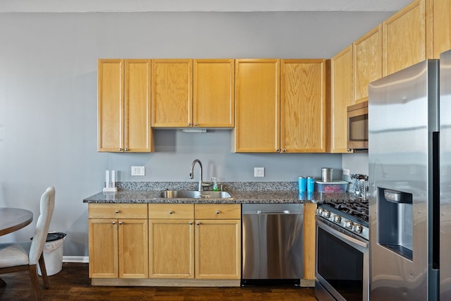 1464 S Michigan Ave Unit 2203, Chicago, IL 60605 - kitchen featuring stainless steel appliances, a sink, dark wood-style floors, light brown cabinetry, and dark stone counters