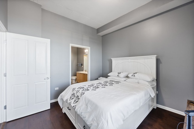 1464 S Michigan Ave Unit 2203, Chicago, IL 60605 - bedroom with dark wood-style floors, baseboards, and connected bathroom