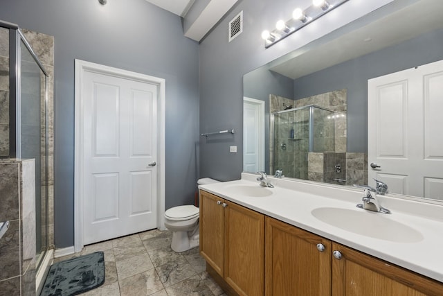 1464 S Michigan Ave Unit 2203, Chicago, IL 60605 - full bathroom featuring a shower stall, double vanity, and toilet