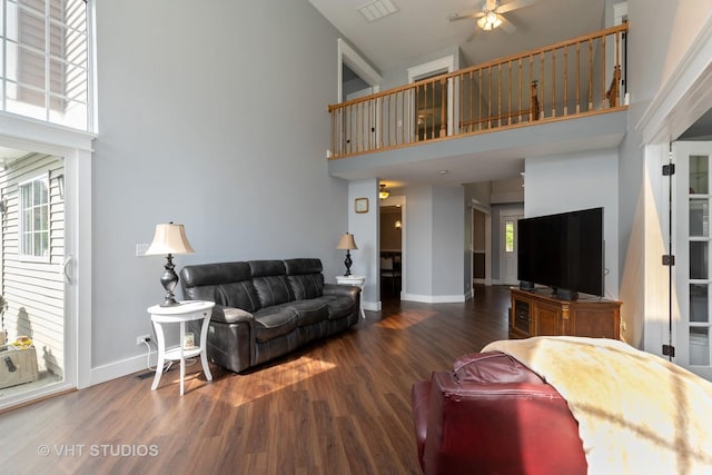 1544 Birmingham Ln, Crystal Lake, IL 60014 - living room featuring a towering ceiling, baseboards, ceiling fan, and wood finished floors