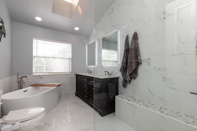 1544 Birmingham Ln, Crystal Lake, IL 60014 - full bathroom featuring double vanity, a freestanding bath, marble tiled flooring, recessed lighting, and tile walls