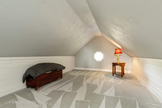 1544 Birmingham Ln, Crystal Lake, IL 60014 - bonus room with lofted ceiling, wood walls, and carpet flooring