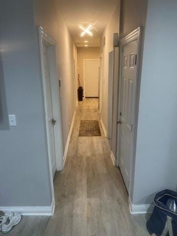 7232 S Rhodes Ave, Chicago, IL 60619 - hallway with light wood finished floors and baseboards