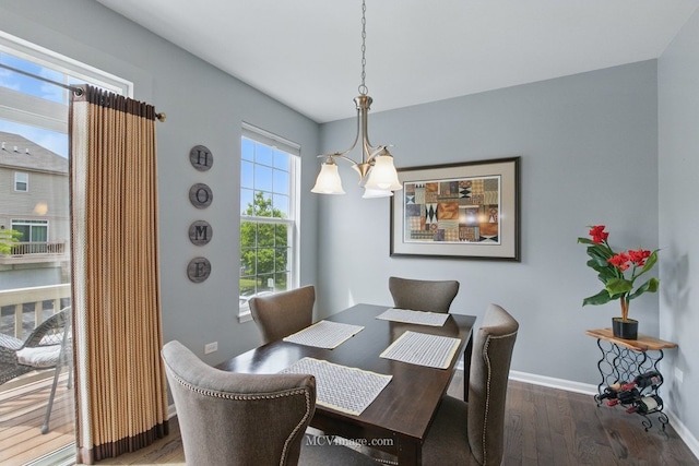 337 Bennett Dr, Carol Stream, IL 60188 - dining space with a chandelier, wood finished floors, and baseboards