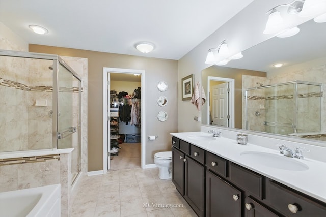 337 Bennett Dr, Carol Stream, IL 60188 - bathroom with a shower stall, double vanity, and a spacious closet