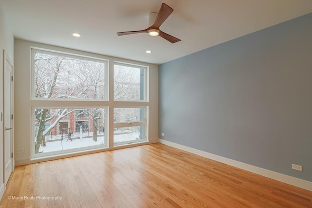 6123 S Ellis Ave, Chicago, IL 60637 - spare room with light wood-style floors, plenty of natural light, baseboards, and recessed lighting