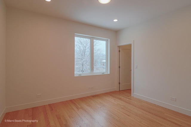 6123 S Ellis Ave, Chicago, IL 60637 - spare room featuring light wood-style flooring, baseboards, and recessed lighting