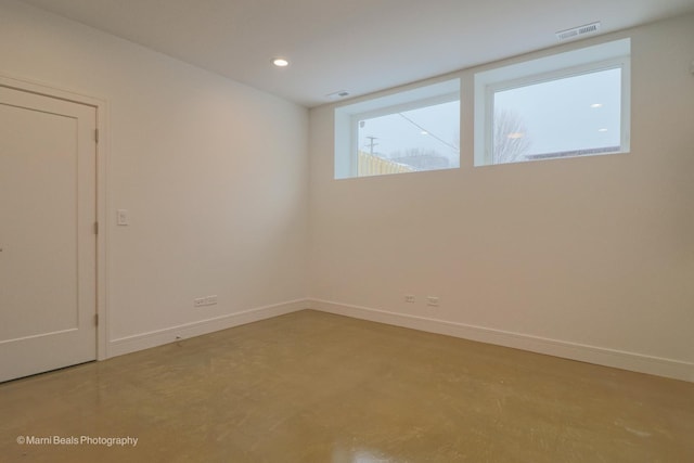 6123 S Ellis Ave, Chicago, IL 60637 - spare room with baseboards, recessed lighting, and concrete floors