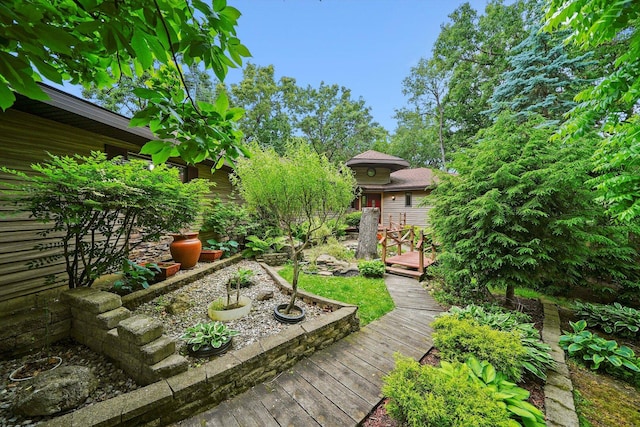 9316 Pine Needle Pass, Bull Valley, IL 60097 - view of yard featuring a wooden deck