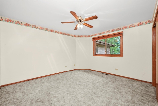 9316 Pine Needle Pass, Bull Valley, IL 60097 - unfurnished room with carpet and a ceiling fan