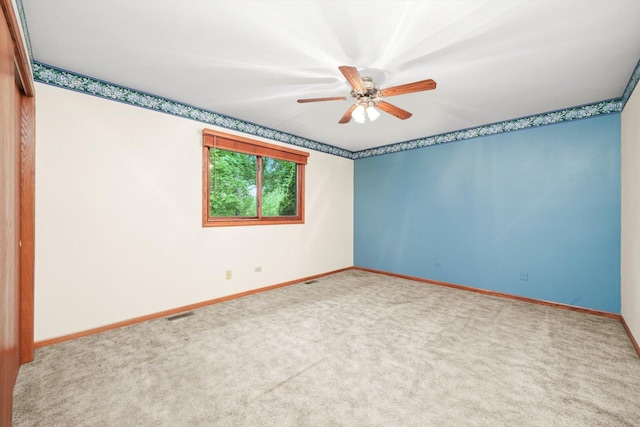 9316 Pine Needle Pass, Bull Valley, IL 60097 - carpeted empty room with baseboards and a ceiling fan
