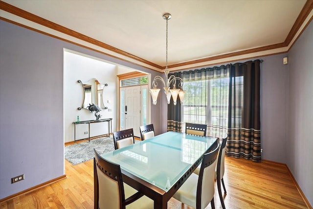 1839 Kings Gate Ln, Crystal Lake, IL 60014 - dining space featuring light wood-style flooring, ornamental molding, and baseboards
