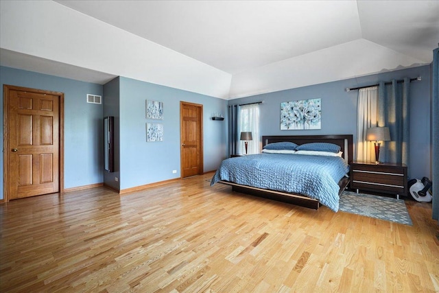 1839 Kings Gate Ln, Crystal Lake, IL 60014 - bedroom with wood finished floors, lofted ceiling, and baseboards
