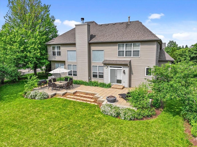 1839 Kings Gate Ln, Crystal Lake, IL 60014 - rear view of property with a patio area, a chimney, an outdoor fire pit, a yard, and a shingled roof