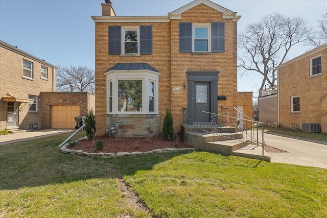 7241 N Kilpatrick Ave, Lincolnwood, IL 60712 - view of front of home featuring a chimney, a front yard, brick siding, and central AC