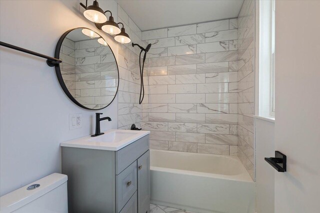 7241 N Kilpatrick Ave, Lincolnwood, IL 60712 - full bathroom featuring toilet, vanity, shower / bath combination, and marble look tile flooring